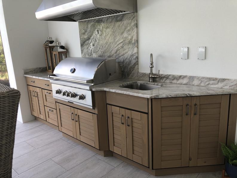 Luxury Outdoor Kitchen with fireplace by Lifestyle Outdoor Kitchens