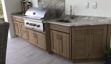 Luxury Outdoor Kitchen with fireplace by Lifestyle Outdoor Kitchens